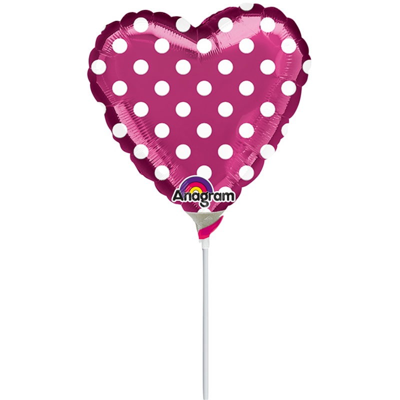 Dotted stick balloon in fuchsia